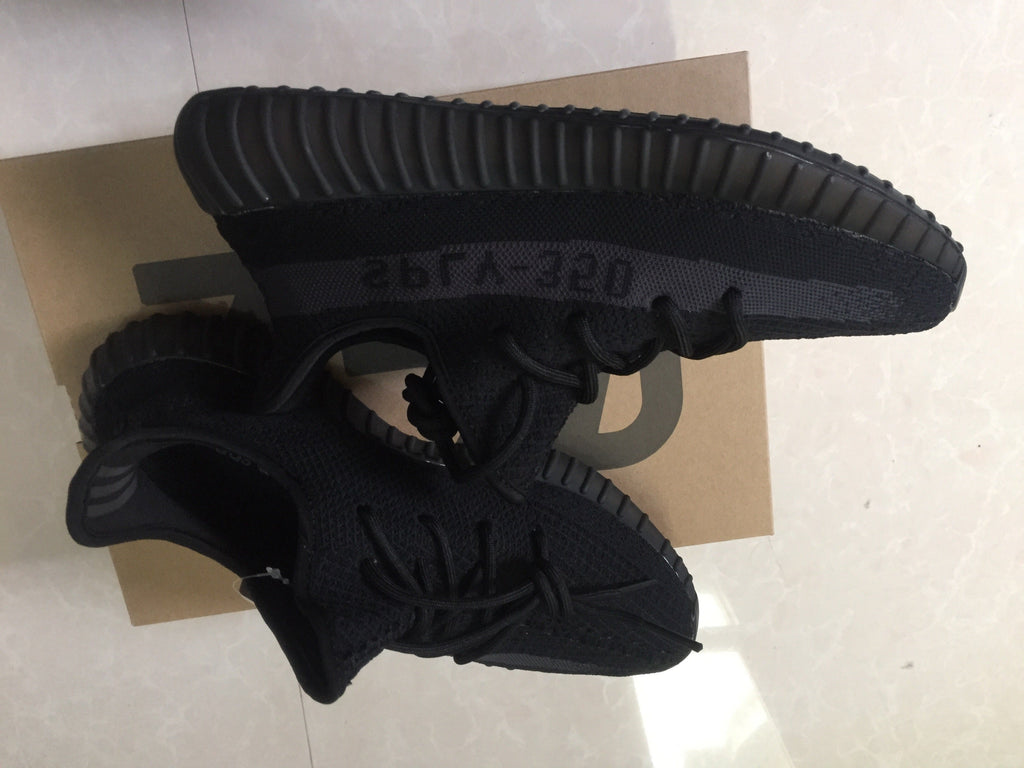 Adidas Yeezy Boost 350 V2 Sneakers in Black Knit - product image from the listing.