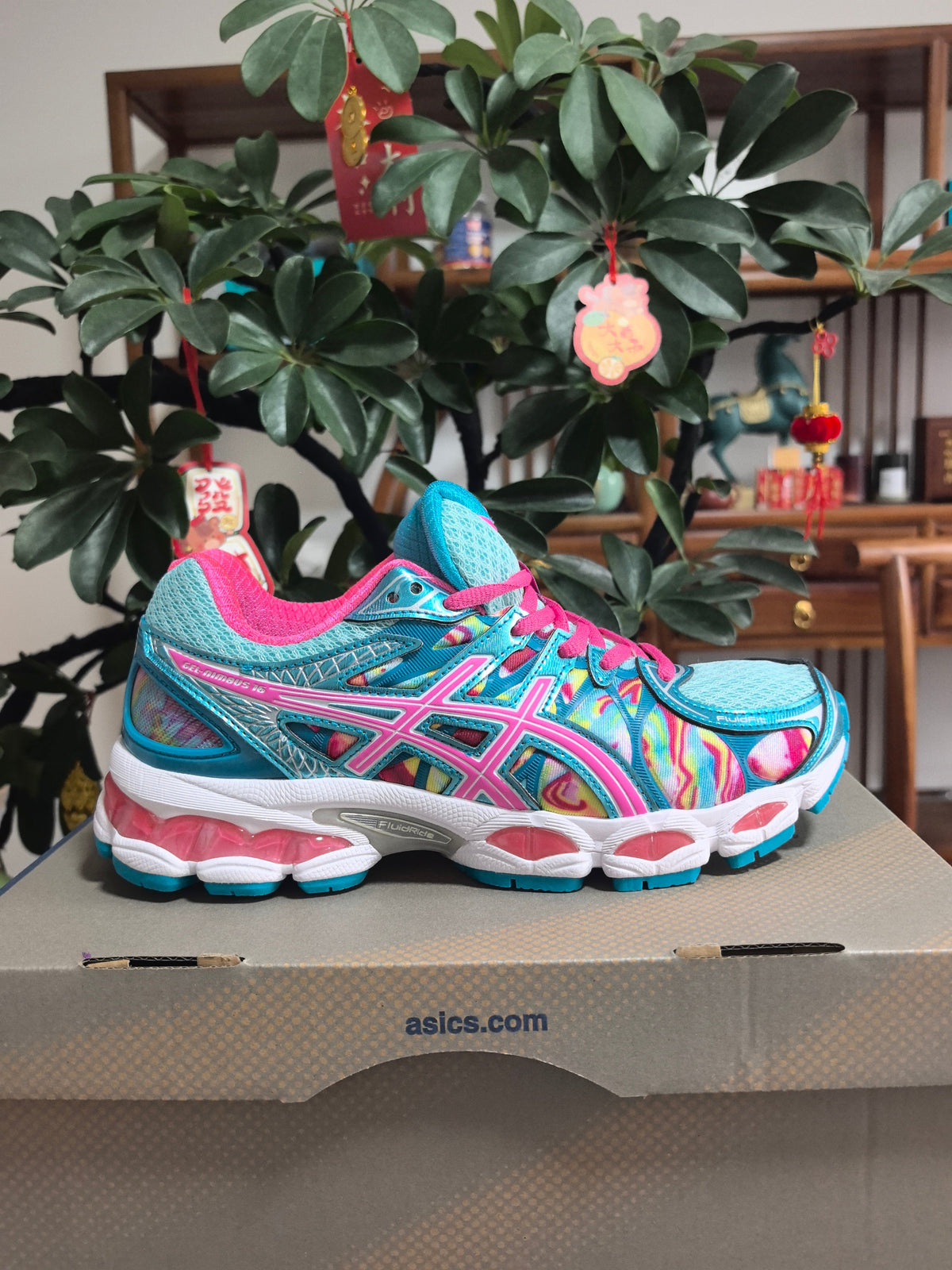 ASICS GEL-Nimbus 16 Sneakers in Pink, in Green and Blue - product image from the listing.