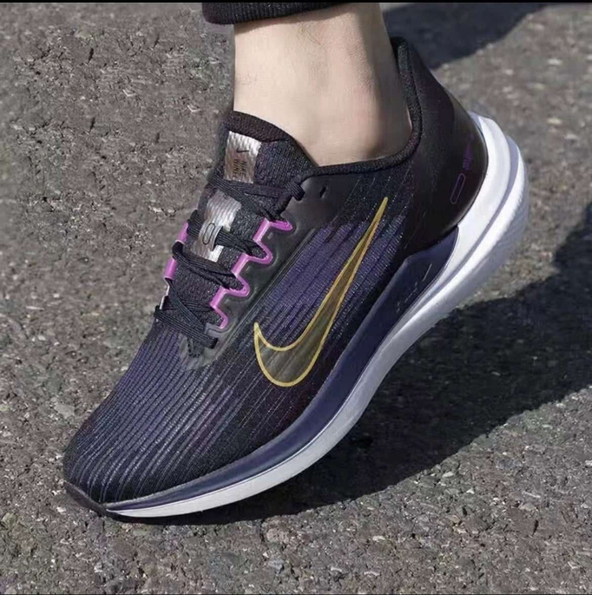 Nike Air Winflo 9 Running Shoes in Black Blue Gold DD6203-007 - product image from the listing.