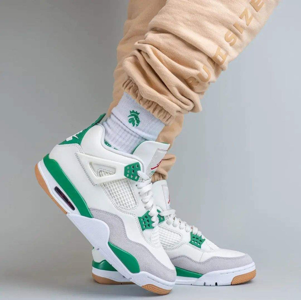 Nike SB x Air Jordan 4 Pine Sneakers in Green DR5415-103 - product image from the listing.