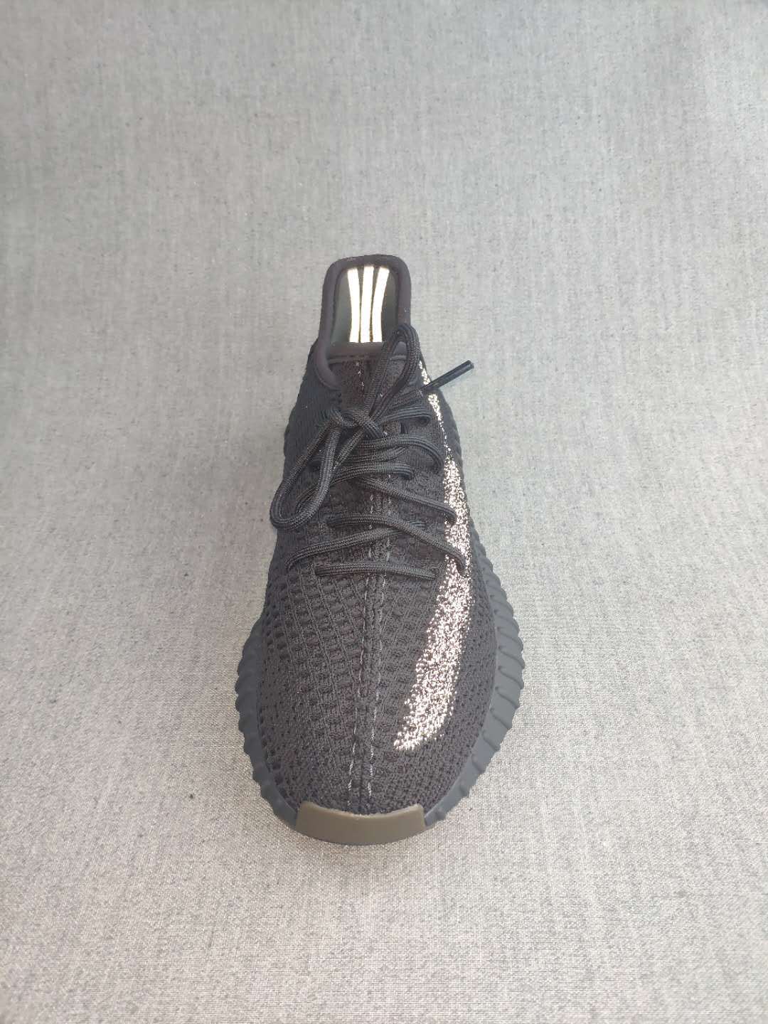 Yeezy Boost 350 V2 Reflective Sneakers in Black - product image from the listing.