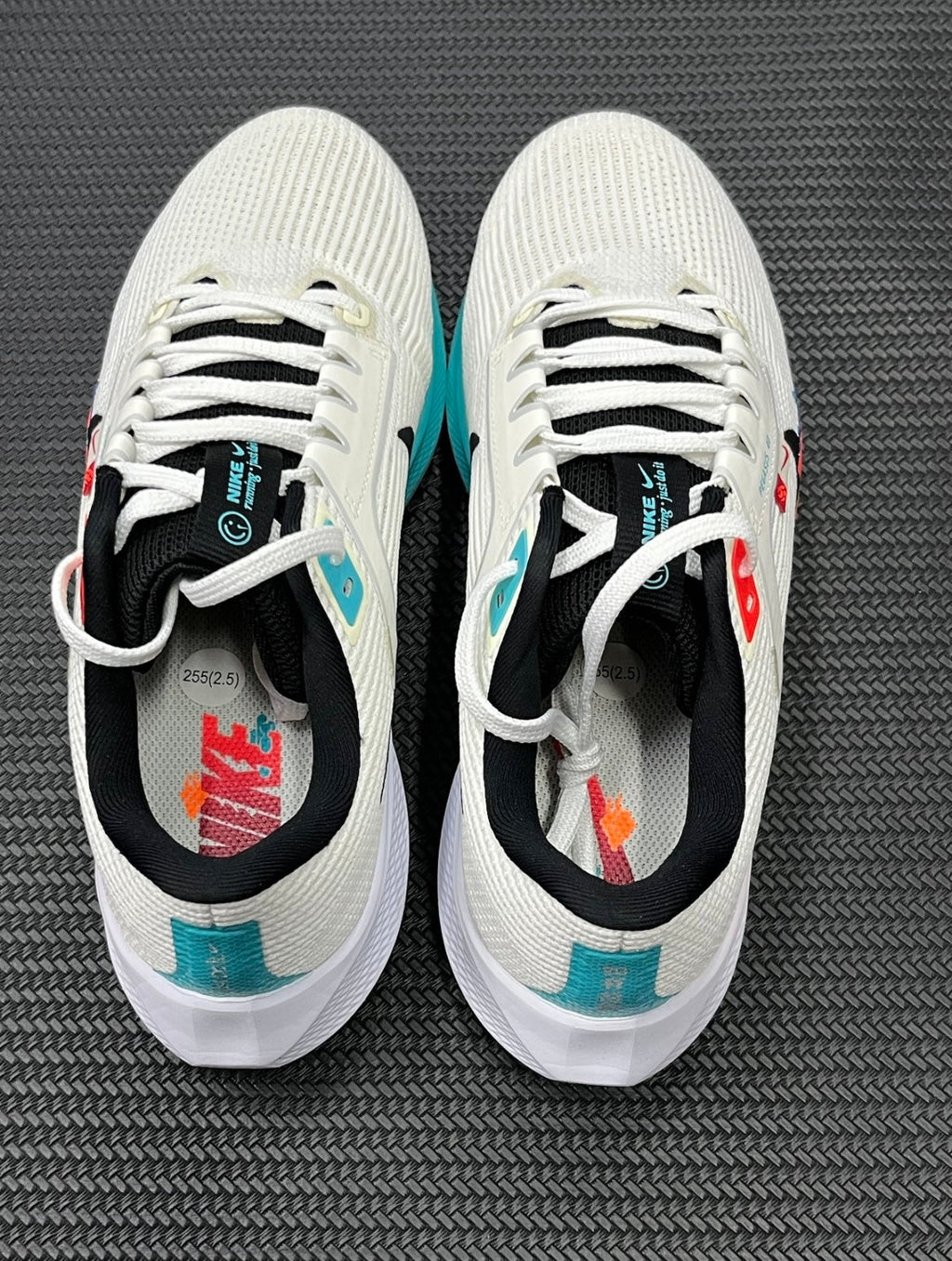 Nike Air Zoom Pegasus 40 Running Shoes in White Multicolor FZ5055-101 - product image from the listing.