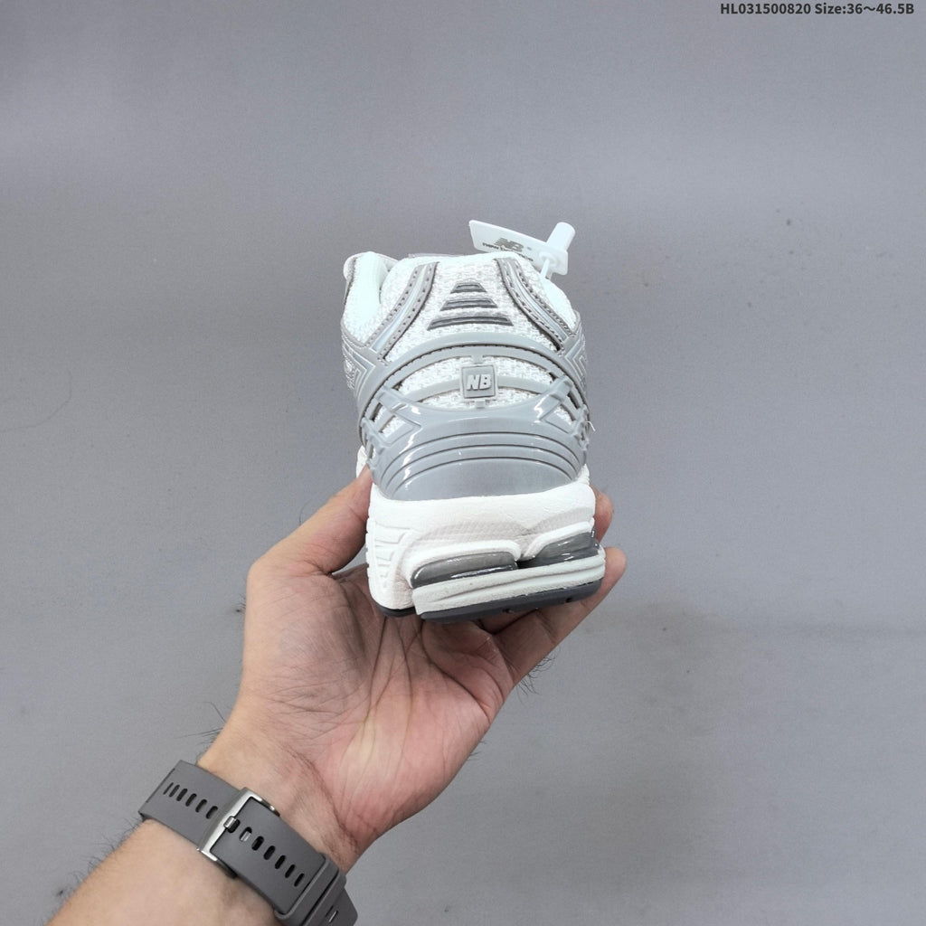 New Balance 1906R Sneakers in White Silver U1906RJM - product image from the listing.