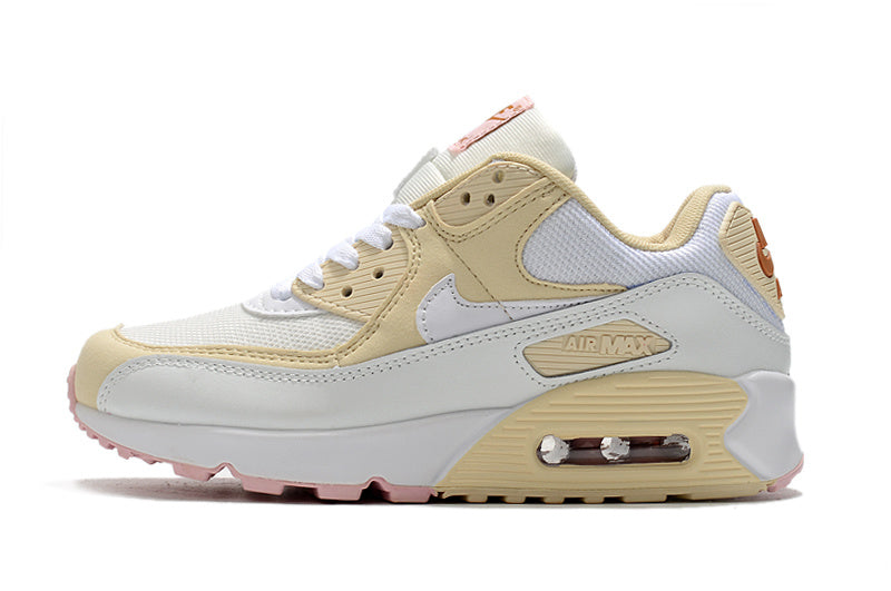 Women's Nike Air Max 90 Sneakers in Cream and Pink - product image from the listing.