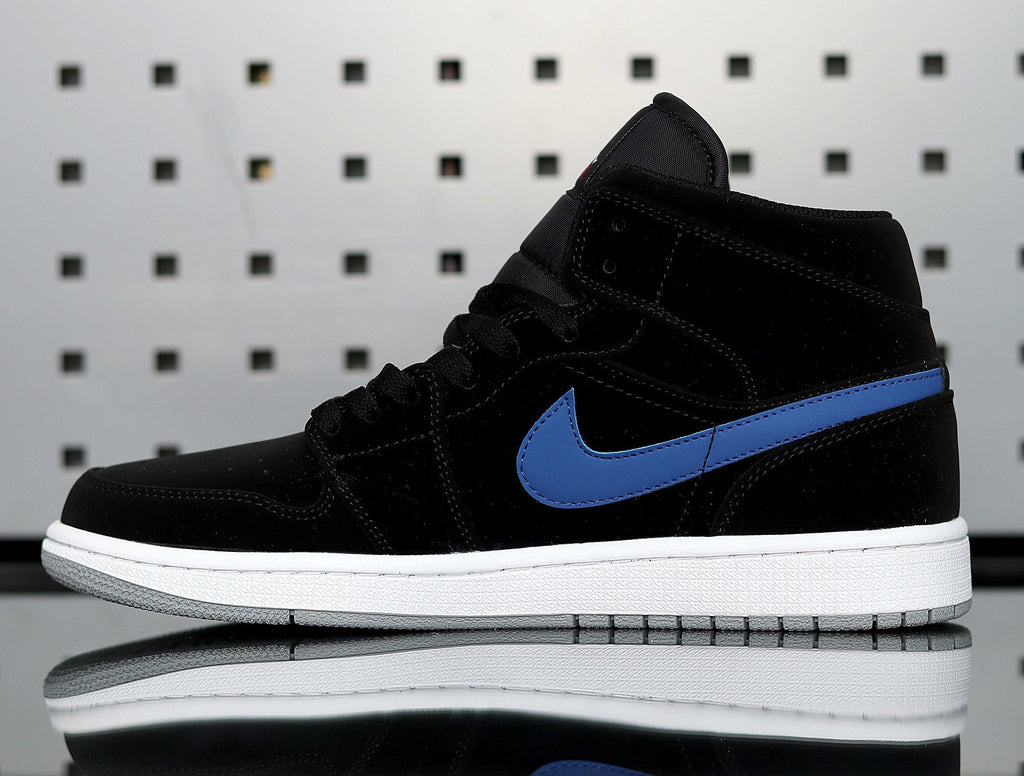 Jordan 1 Retro High Sneakers in Black Red Blue 554725-065 - product image from the listing.