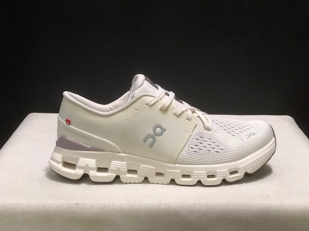 On Cloud X 4 Running Sneakers in Ivory - product image from the listing.