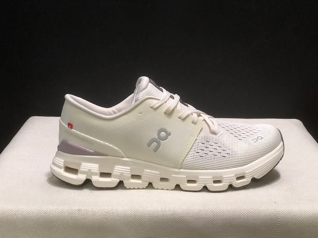On Cloud X 4 Running Sneakers in Ivory - product image from the listing.