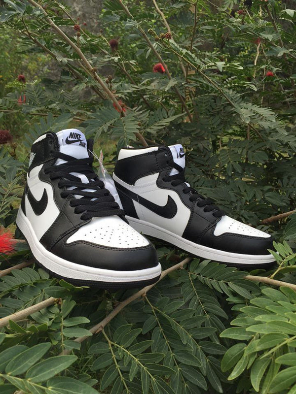Jordan 1 High Sneakers in Black and White - product image from the listing.