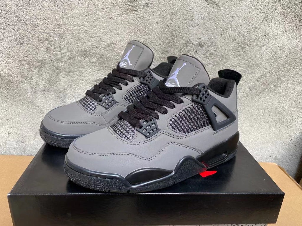 Air Jordan 4 Sneakers in Grey & Black - product image from the listing.