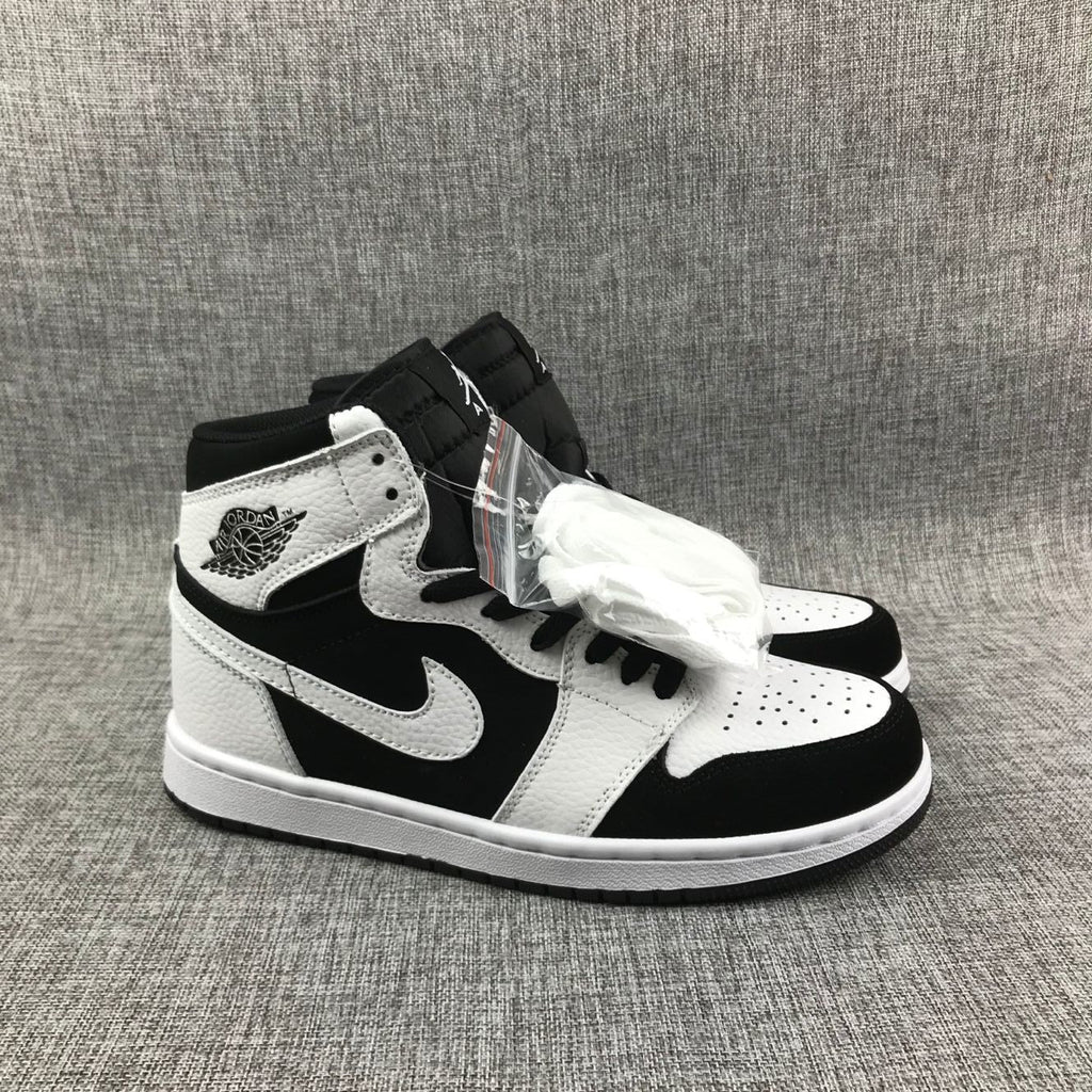 Air Jordan 1 High Sneakers in Black and White 554724-113 - product image from the listing.