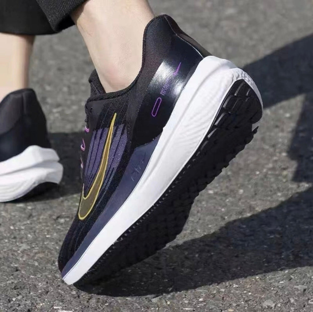 Nike Air Winflo 9 Running Shoes in Black Blue Gold DD6203-007 - product image from the listing.