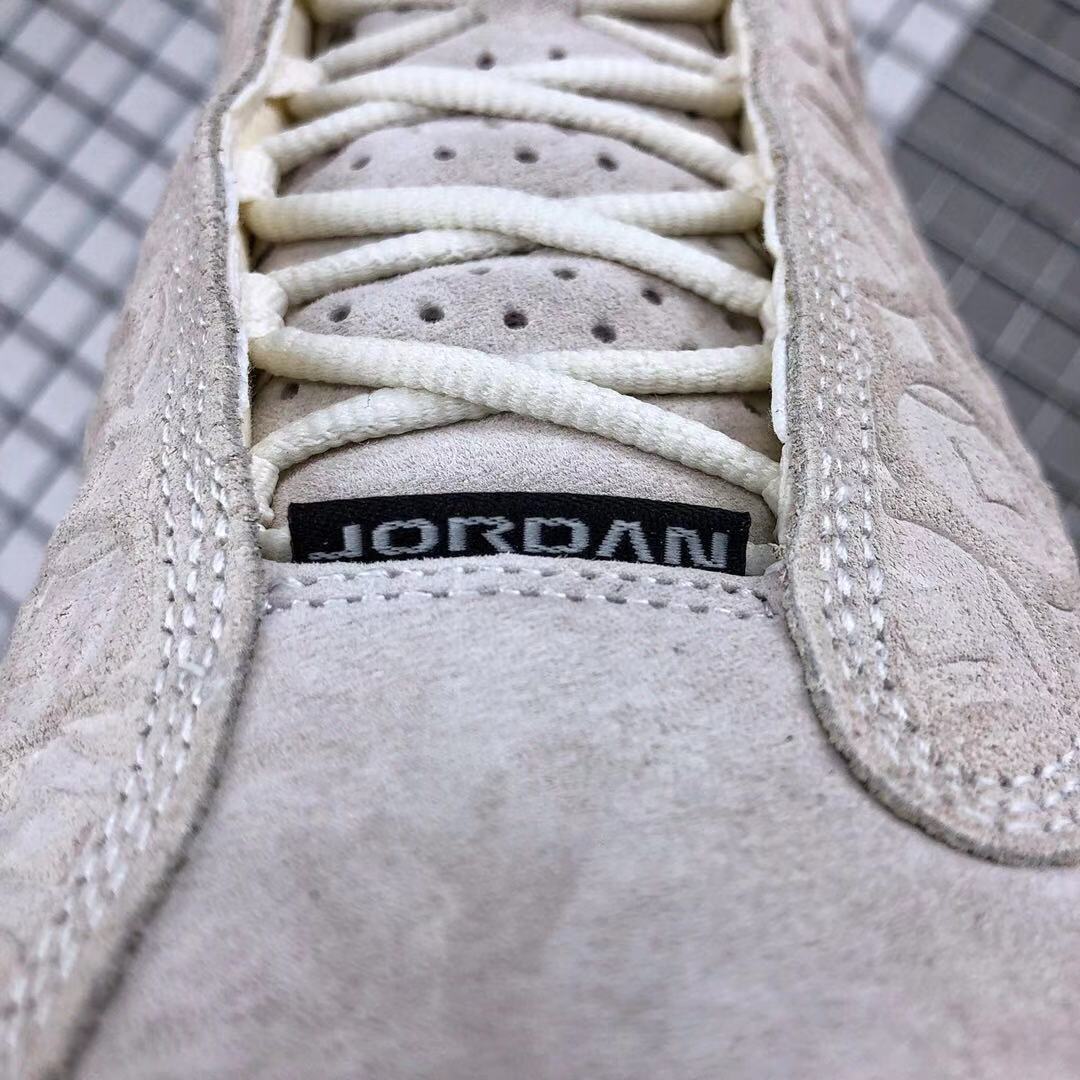 Air Jordan 13 CNY Sneakers in White, in Gold and Pink - product image from the listing.