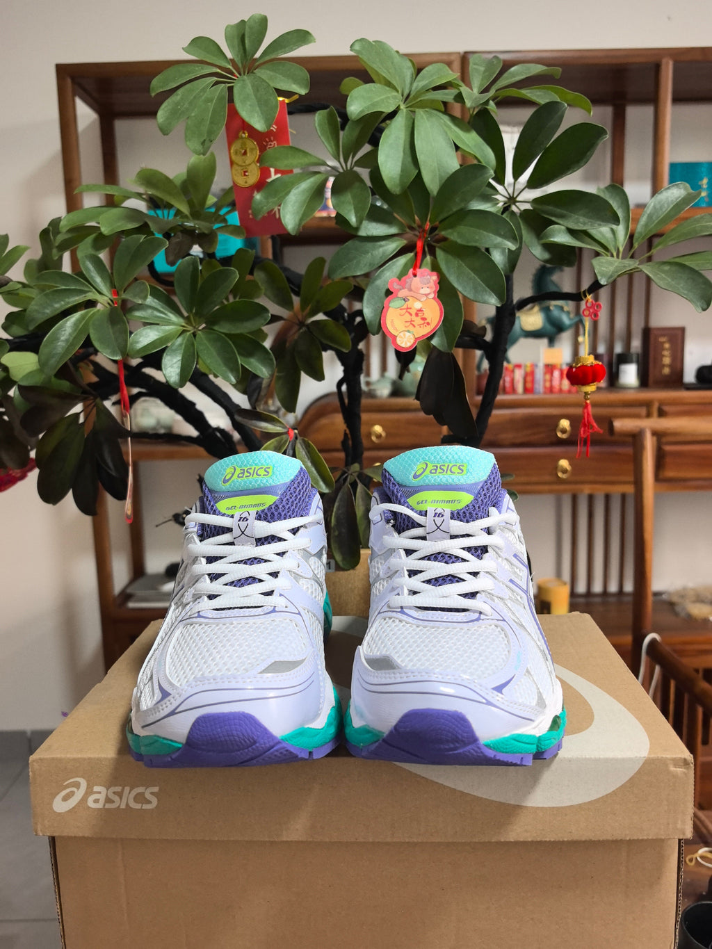 Blue and Purple ASICS GEL-NIMBUS 16 Sneakers - product image from the listing.