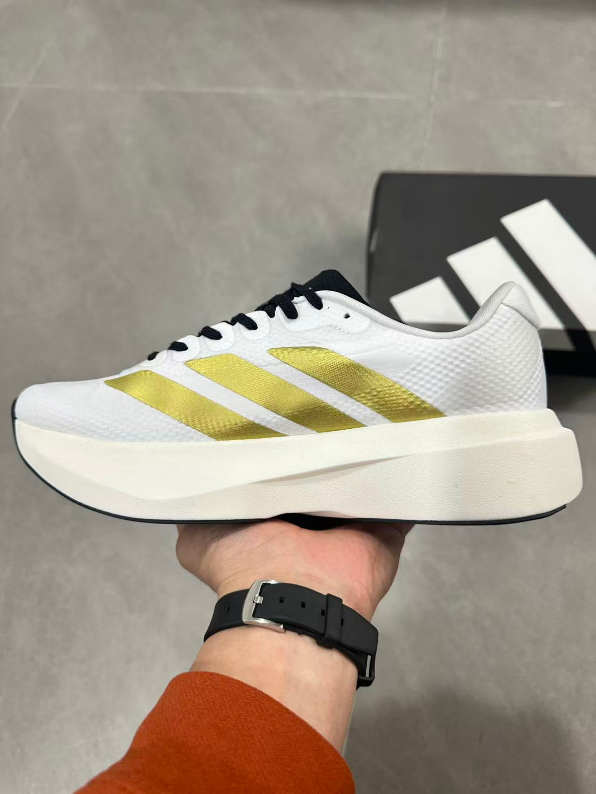Adidas Lightstrike Pro Running Shoes in White Gold JQ4441 - product image from the listing.