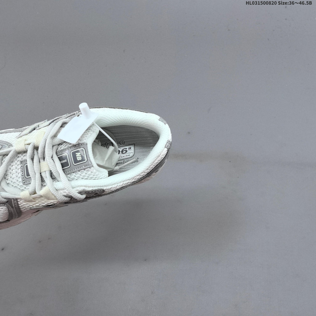 New Balance 1906R Sneakers in White Silver U1906RJM - product image from the listing.