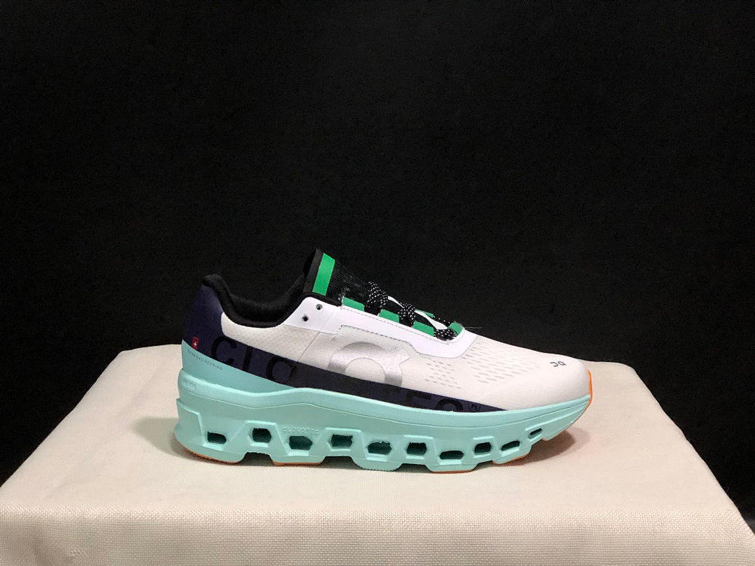 White and Aqua On Cloudmonster Running Shoes - product image from the listing.
