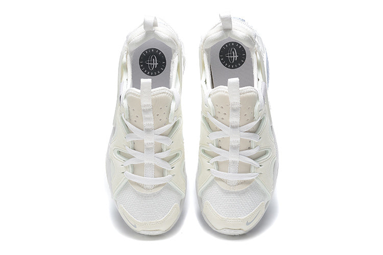 White and Pale Blue Nike Air Huarache Run Sneakers - product image from the listing.
