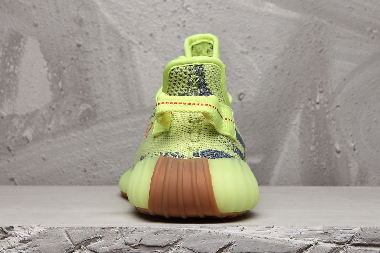 Lime Green and Brown Adidas Yeezy Boost 350 V2 Sneaker - product image from the listing.