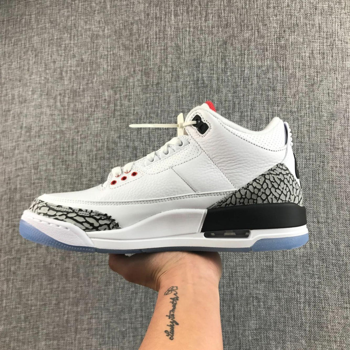 Air Jordan 3 White Cement Sneakers with Translucent Blue Sole - product image from the listing.
