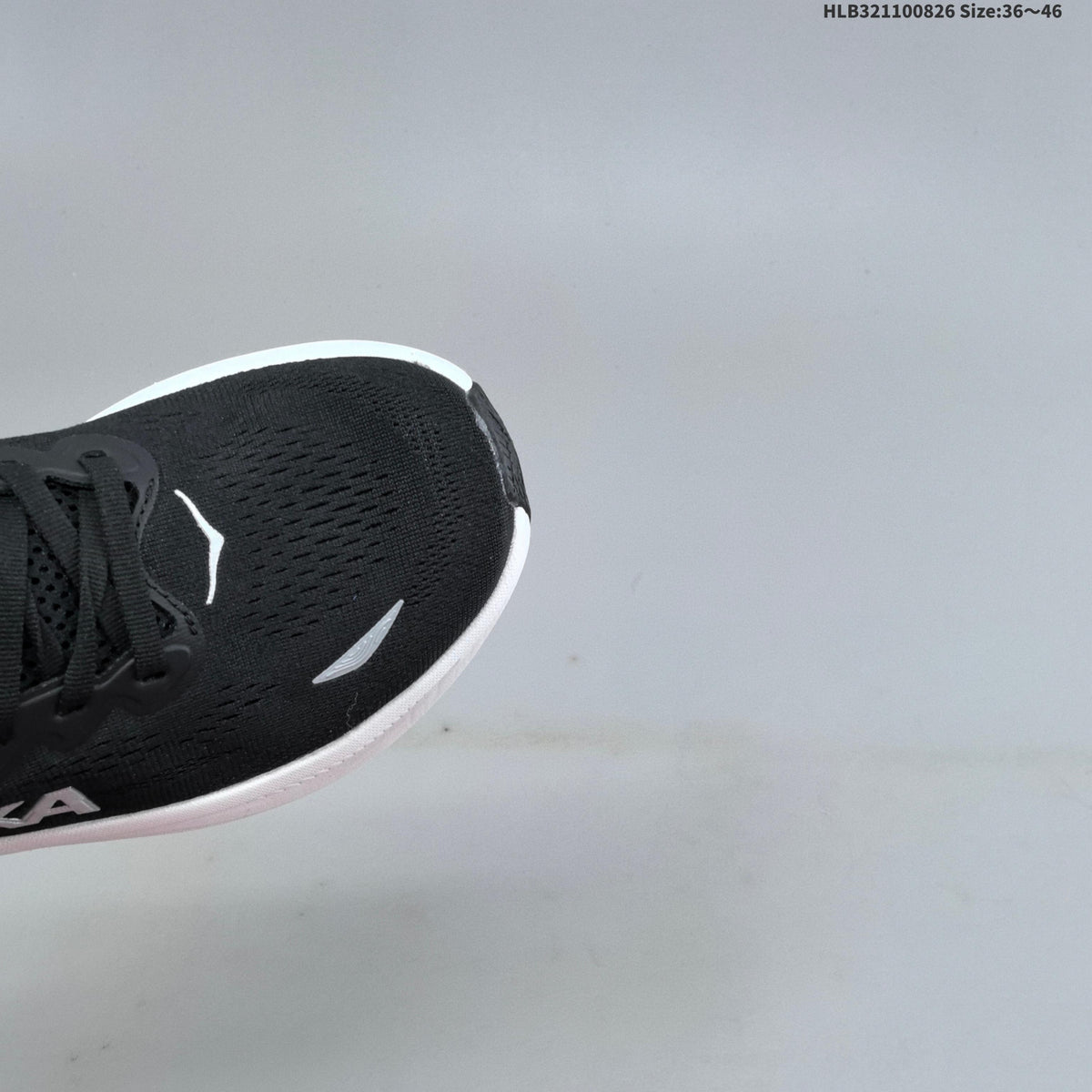 HOKA Bondi 9 Running Shoes in Black and White - product image from the listing.