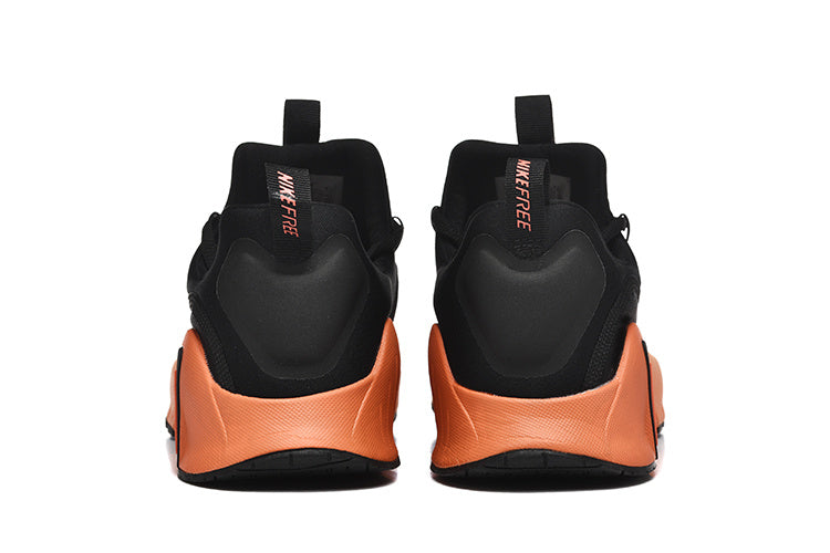Nike Free TR Fitness Sneakers in Black and Coral - product image from the listing.
