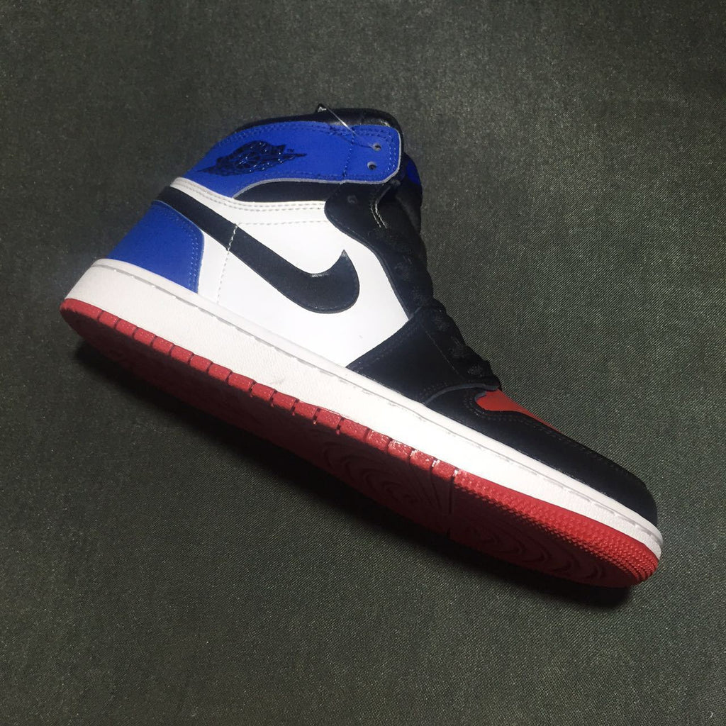 Jordan 1 High Three-Color Sneaker in Black, in Blue and Red - product image from the listing.