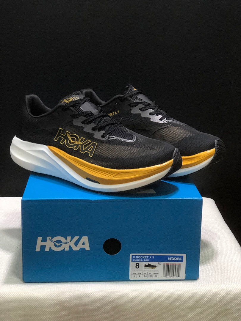 Black and Gold HOKA Rocket X 3 Running Shoes - product image from the listing.