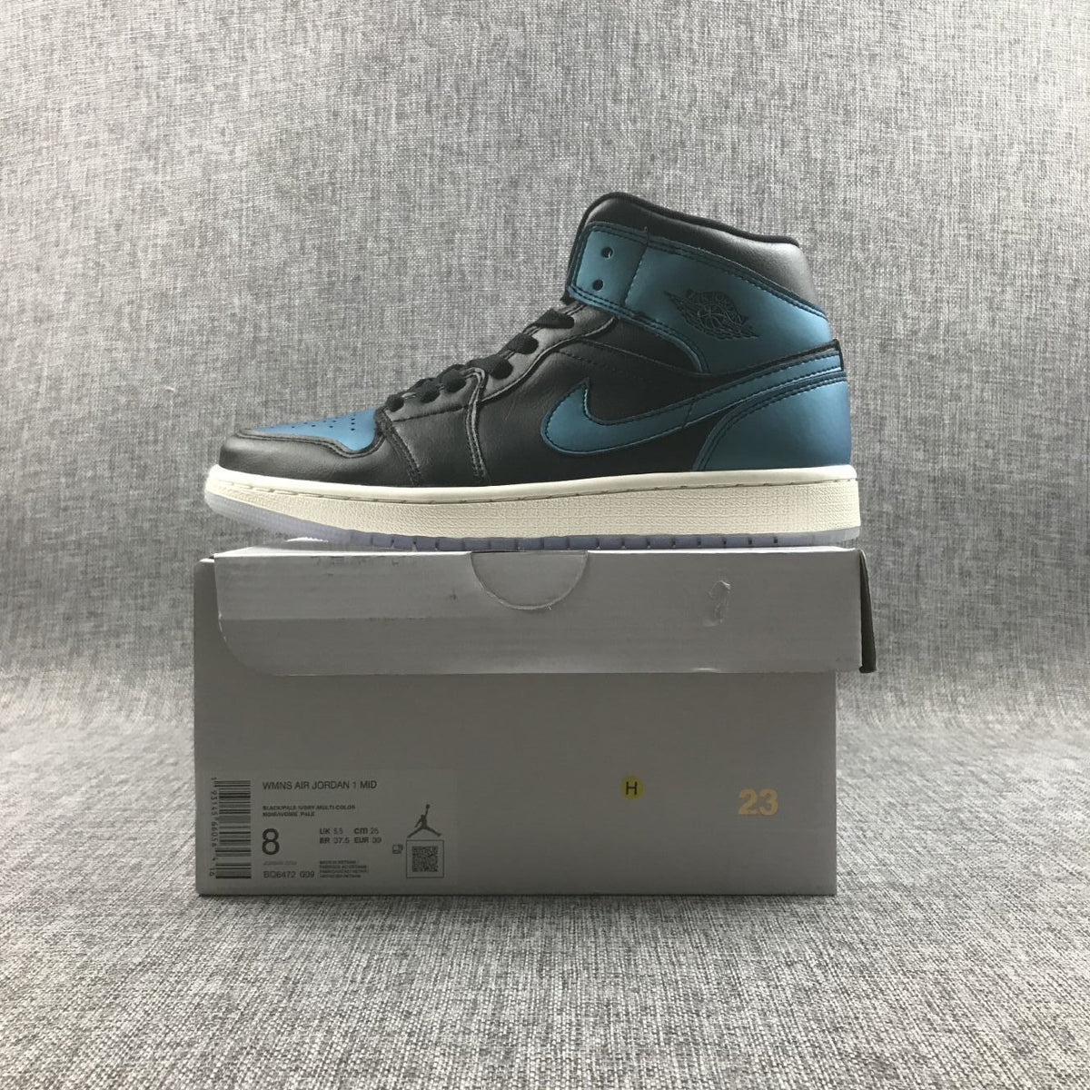 Air Jordan 1 Mid BQ6472-009 Sneakers in Black and Turquoise - product image from the listing.