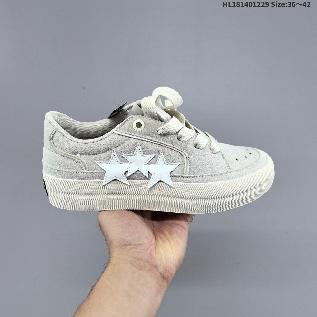 AMIRI Star Low-Cut Sneakers with Leopard Print Details - product image from the listing.