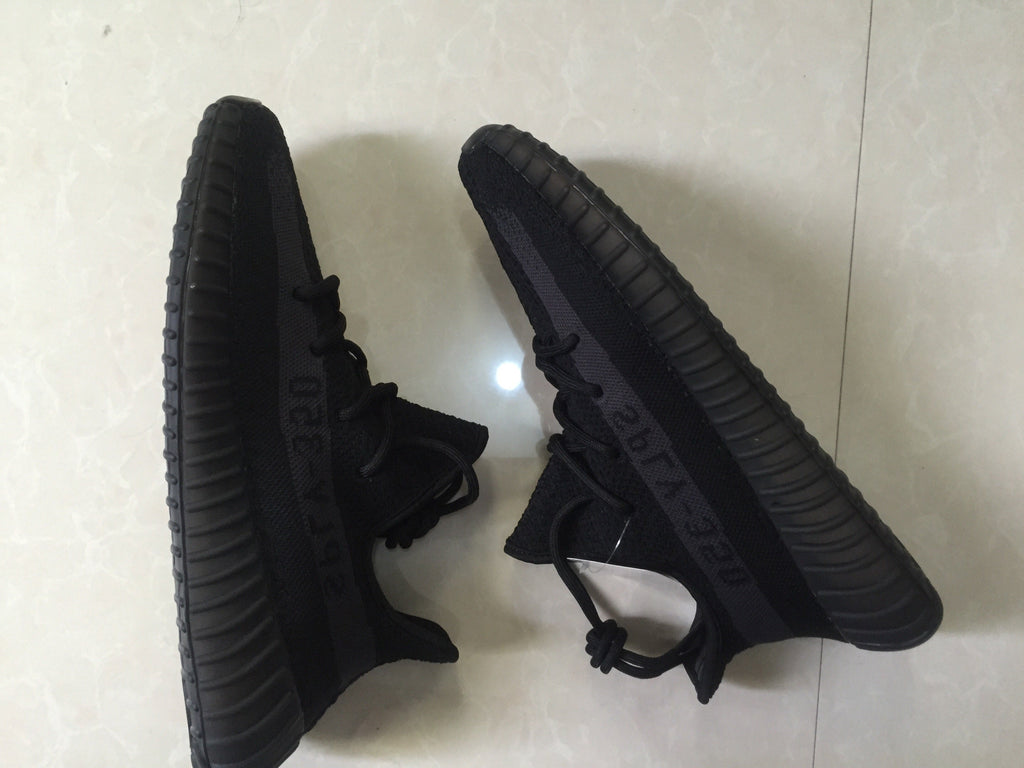 Adidas Yeezy Boost 350 V2 Sneakers in Black Knit - product image from the listing.