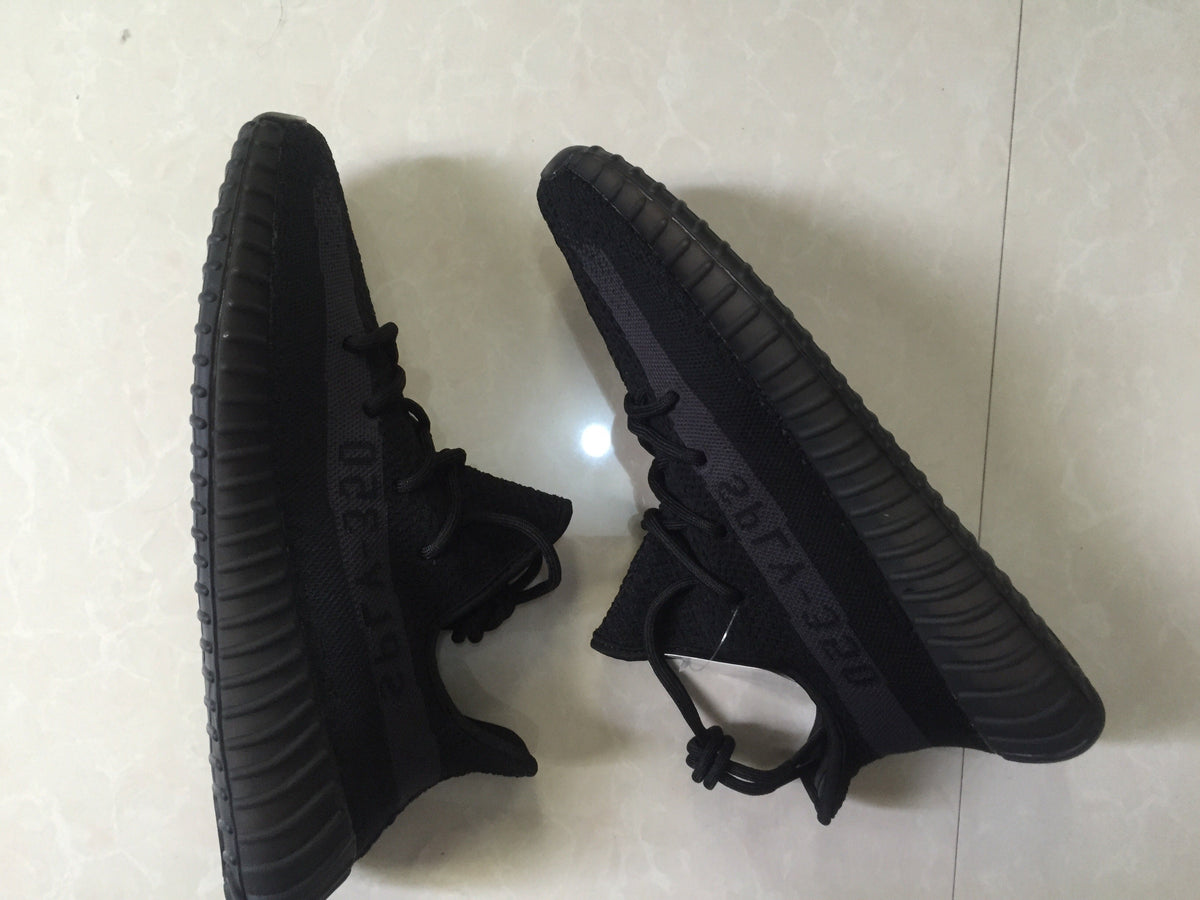 Adidas Yeezy Boost 350 V2 Sneakers in Black Knit - product image from the listing.