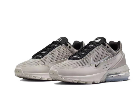 Light Grey and White Nike Air Max Sneaker - product image from the listing.