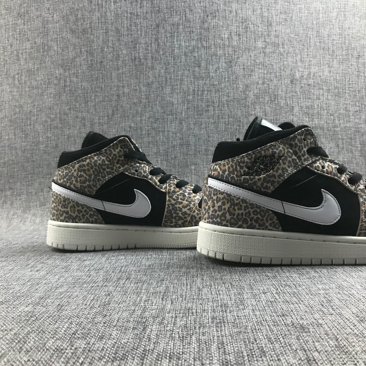 Leopard Print Sneakers - Air Jordan 1 Mid SE GS BQ6931-021 - product image from the listing.
