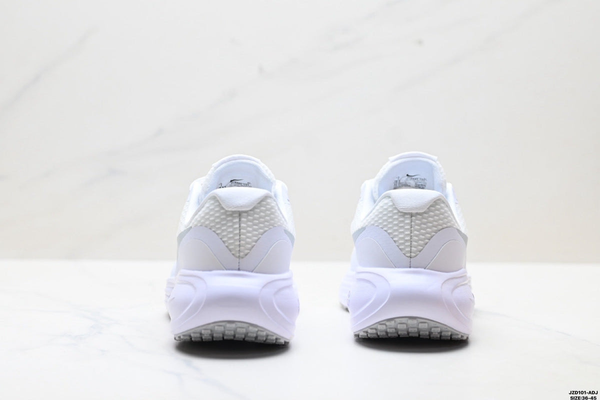 Nike Revolution 8 Running Shoes in White and Light Purple - product image from the listing.