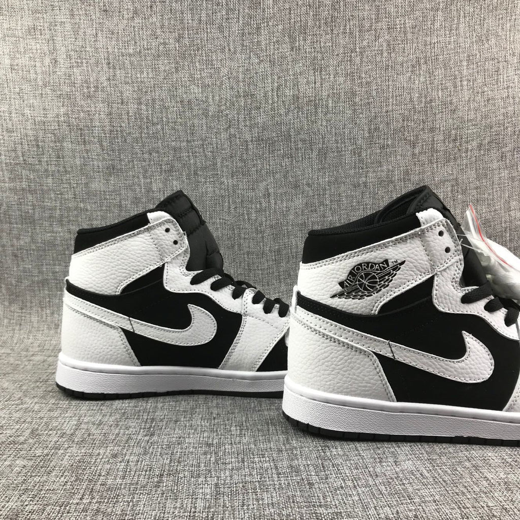 Air Jordan 1 High Sneakers in Black and White 554724-113 - product image from the listing.