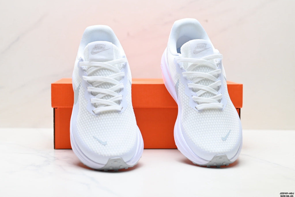 Nike Revolution 8 Running Shoes in White and Light Purple - product image from the listing.