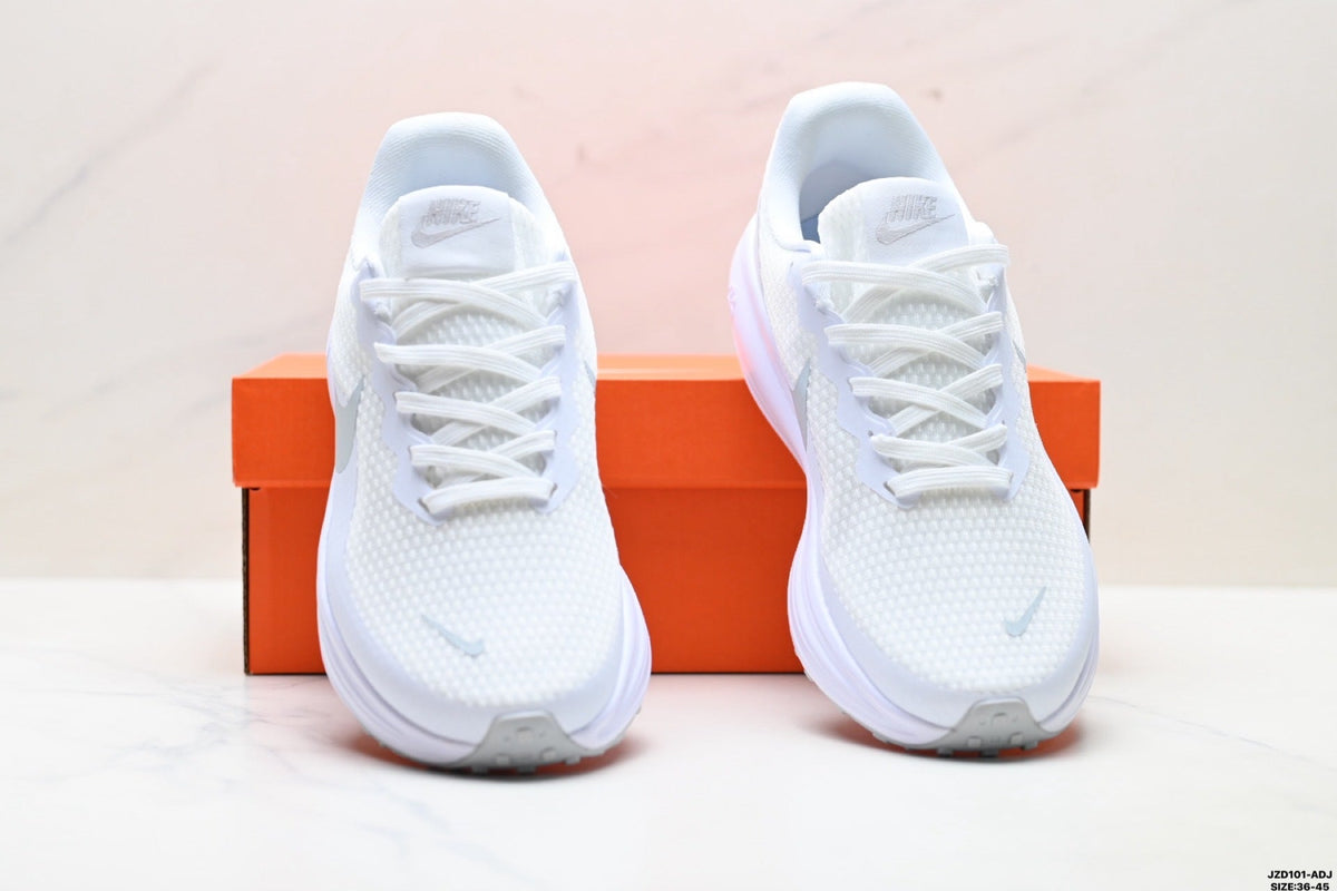 Nike Revolution 8 Running Shoes in White and Light Purple - product image from the listing.