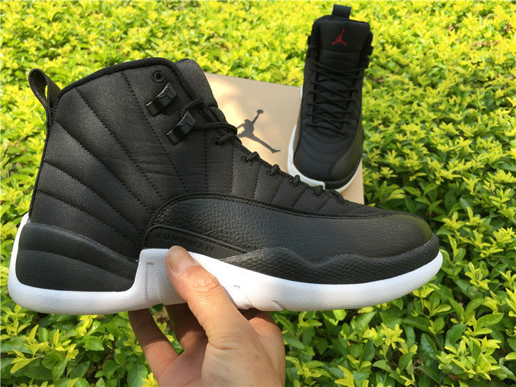 Air Jordan 12 Black Nylon High-Top Sneakers - product image from the listing.