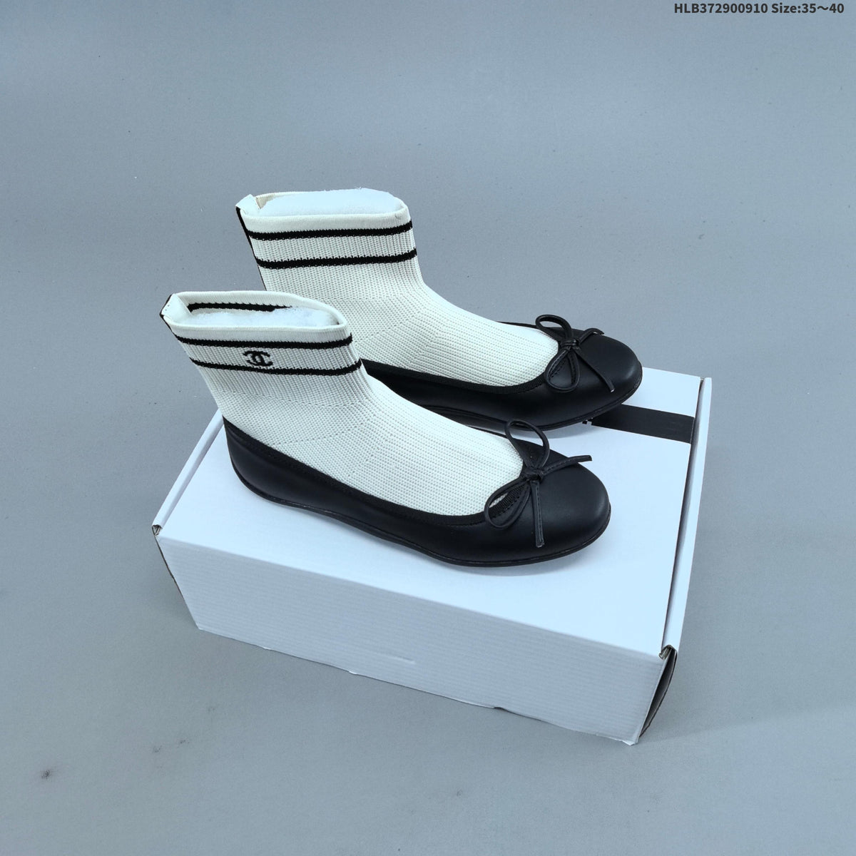 Chanel Sock Ballet Flats with Bow, in Black and White - product image from the listing.
