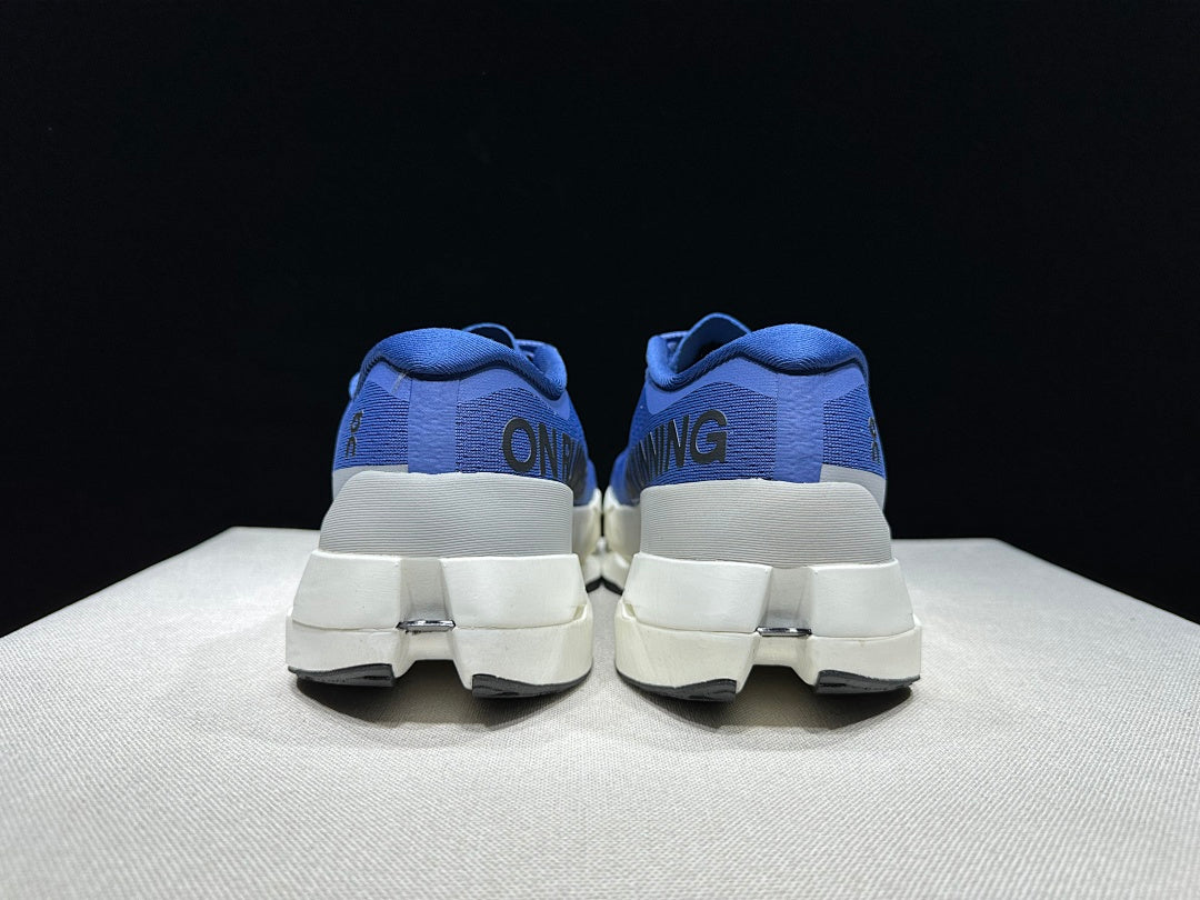 On Cloudboom Max Running Shoes, in Blue and White - product image from the listing.