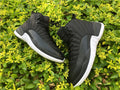 Air Jordan 12 Black Nylon High-Top Sneakers - product image from the listing.