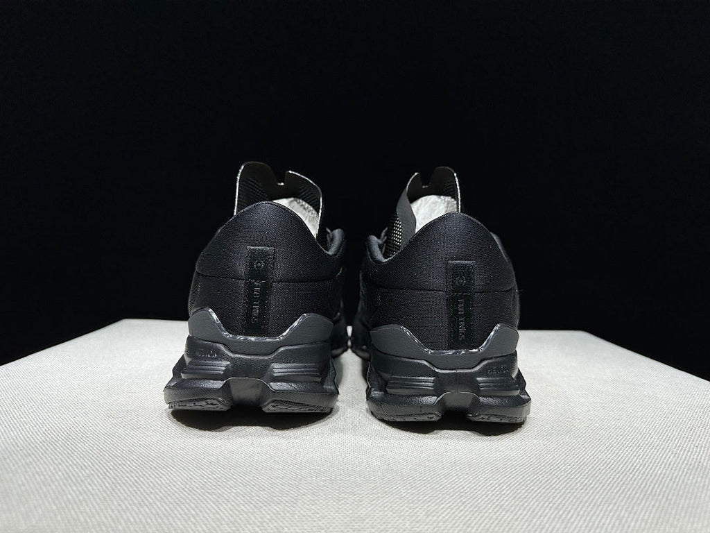 On Cloud X4 FKA Twigs Sneakers in Black - product image from the listing.