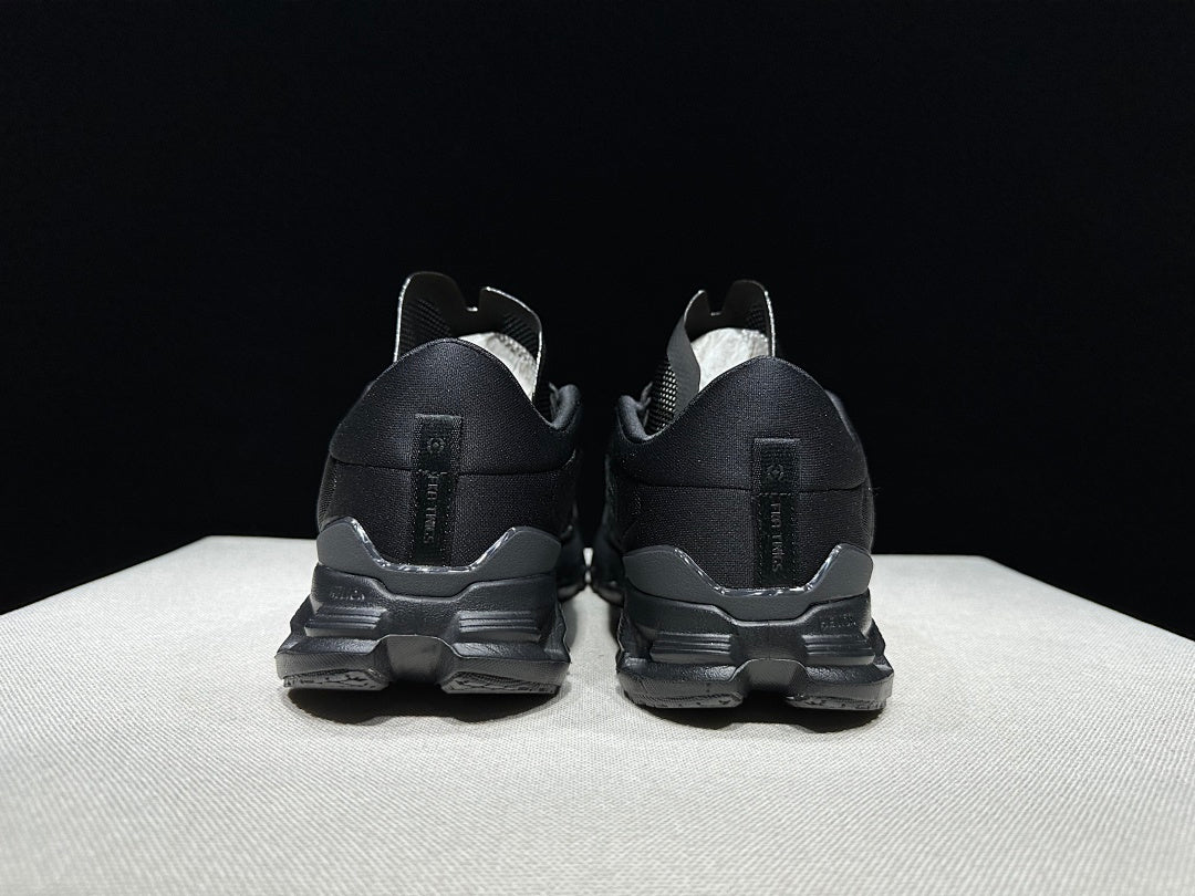 On Cloud X4 FKA Twigs Sneakers in Black - product image from the listing.