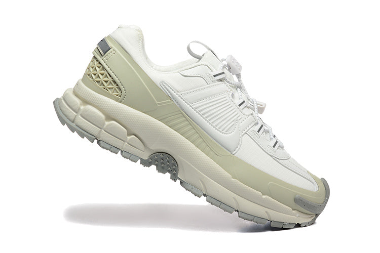 Nike Vomero Sneakers in White and Sage in Green - product image from the listing.