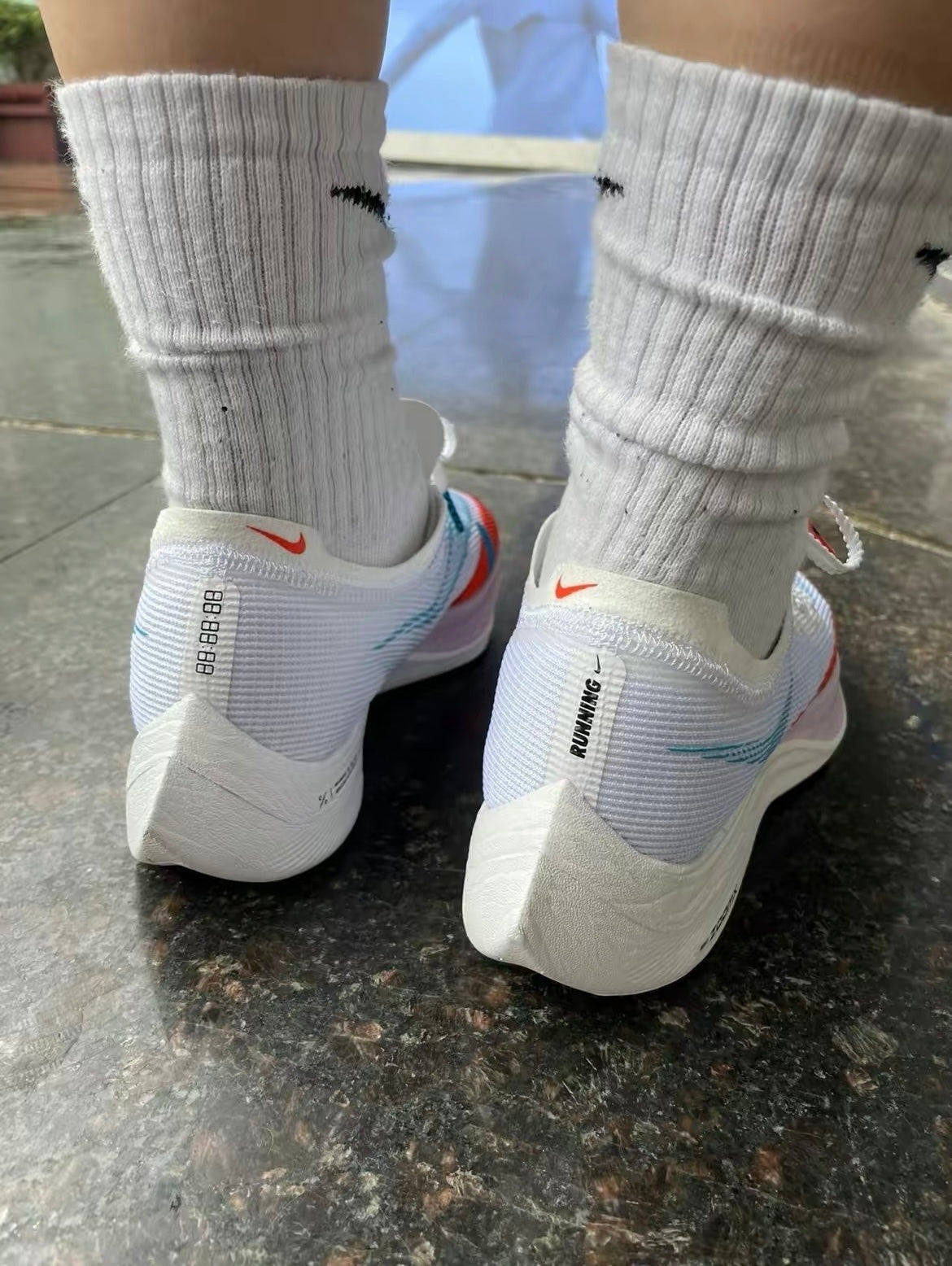 Nike ZoomX Vaporfly NEXT% 2 Running Shoes in White Blue Red CU4123-102 - product image from the listing.
