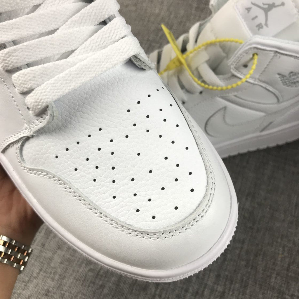 Air Jordan 1 Mid Sneakers in White - product image from the listing.