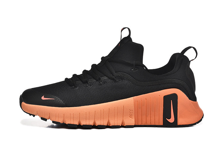Nike Free TR Fitness Sneakers in Black and Coral - product image from the listing.
