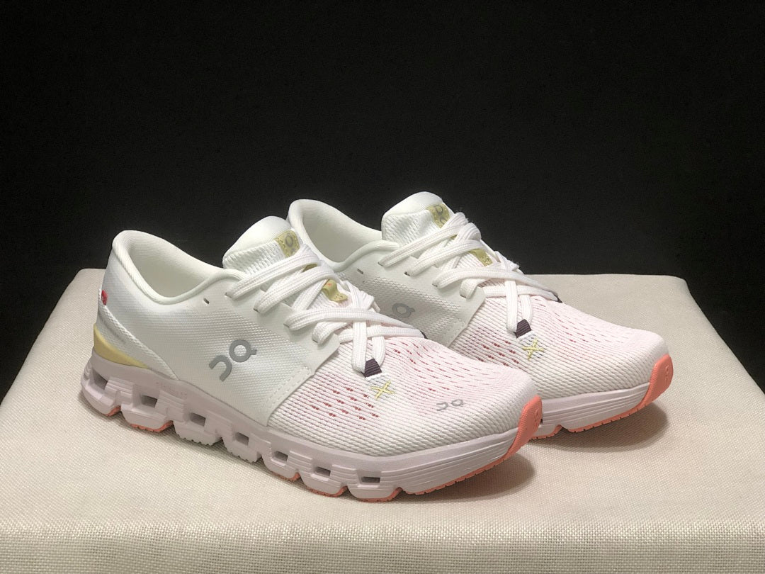 On Cloud X 4 Sneakers in White Yellow Pink - product image from the listing.