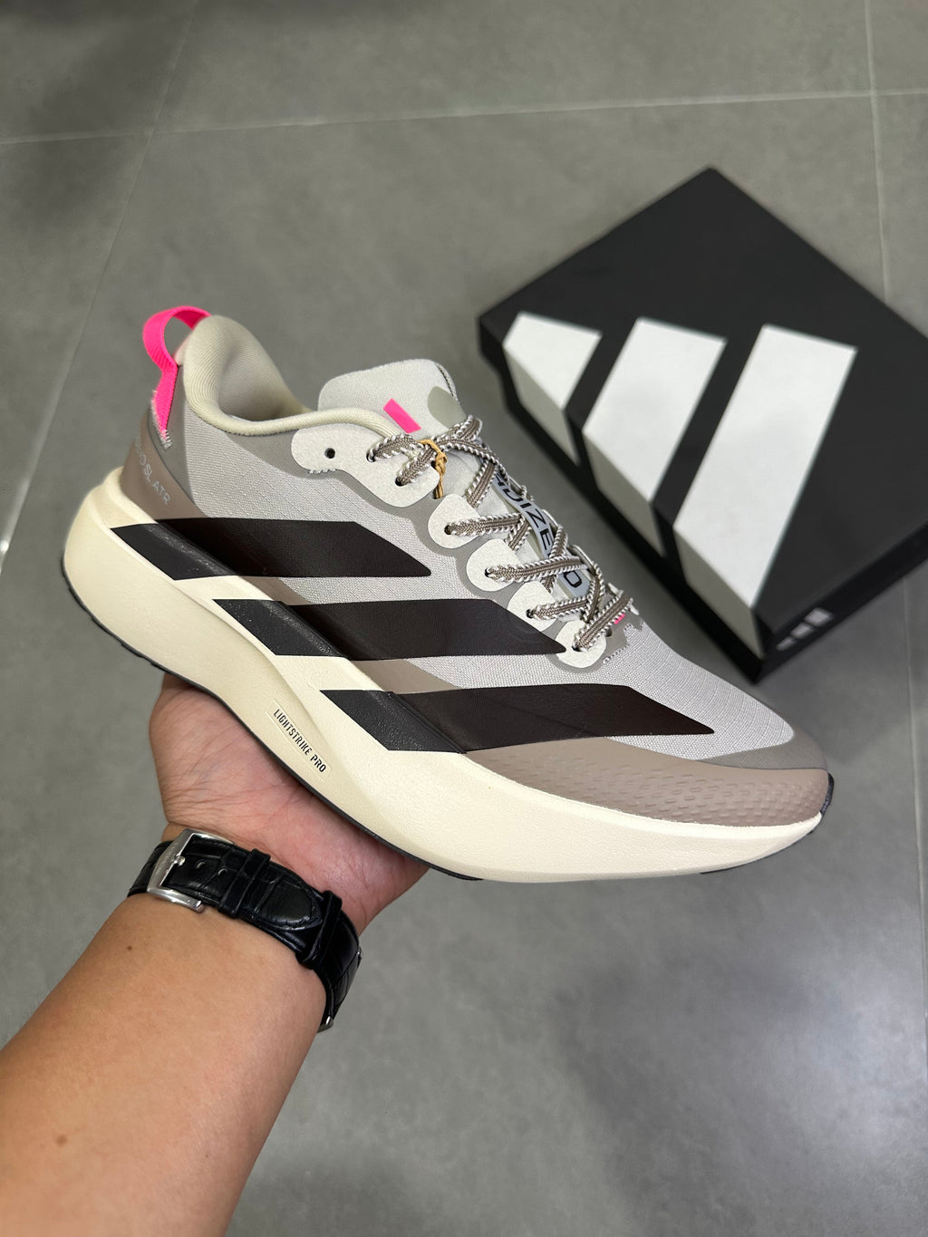 Adidas Adizero SL 2 Running Shoes, in Beige and Black KI5181 - product image from the listing.