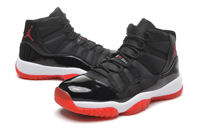 Air Jordan 11 Retro High Basketball Sneakers in Black Red - product image from the listing.